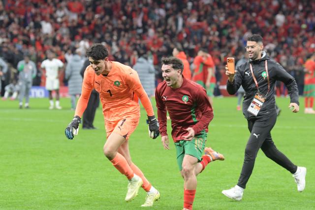 (260115) -- RABAT, Jan. 15, 2026 (Xinhua) -- Morocco's Brahim Diaz (C) and goalkeeper Yassine Bounou (L) celebrate after winning the Africa Cup of Nations semifinal match between Morocco and Nigeria in Rabat, Morocco, Jan. 14, 2026. (Photo by Aissa/Xinhua)