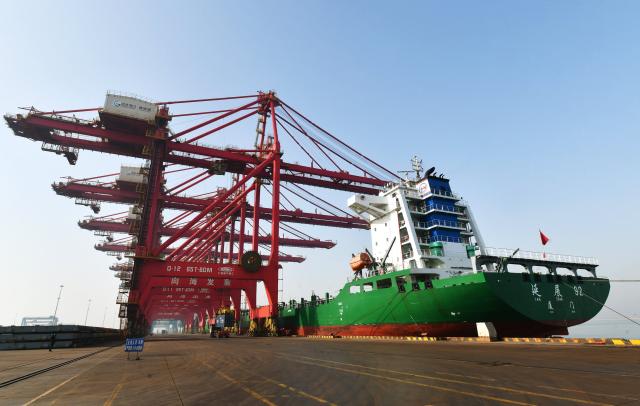 (260115) -- CANGZHOU, Jan. 15, 2026 (Xinhua) -- A cargo ship is berthed at a container terminal at Huanghua Port, Cangzhou City of north China's Hebei Province, on Jan. 15, 2026. The cargo throughput of Huanghua Port reached 366 million tonnes in 2025, an increase of 3.08 percent year on year, which set a historical high, according to statistics with Cangzhou Port Group. (Photo by Yuan Liwei/Xinhua)