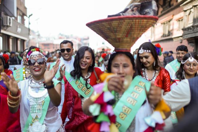 (260115) -- KATHMANDU, Jan. 15, 2026 (Xinhua) -- People dance to celebrate the Maghe Sankranti Festival in Kathmandu, Nepal, Jan. 15, 2026. Nepali Hindus celebrate the festival across the country, during which people take a ritual bath at river confluences, offer prayers at temples and enjoy traditional delicacies. (Photo by Sulav Shrestha/Xinhua)