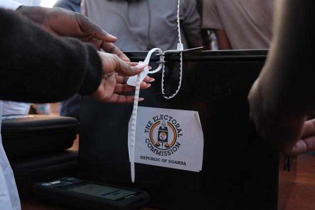 (260115) -- KAMPALA, Jan. 15, 2026 (Xinhua) -- Election officials check the seal of a ballot box at a polling station in Kampala, Uganda, on Jan. 15, 2026. Presidential and parliamentary elections kicked off in Uganda as people queued to cast ballots on Thursday.
   More than 21 million Ugandans are expected to vote to elect the president, 353 directly elected members of parliament and 146 district women representatives on the day.
   Eight candidates are vying for the presidency, including incumbent President Yoweri Museveni, who is seeking a seventh five-year term in office. His main rival is Robert Kyagulanyi, also known as Bobi Wine, a pop-star-turned politician. (Photo by Hajarah Nalwadda/Xinhua)