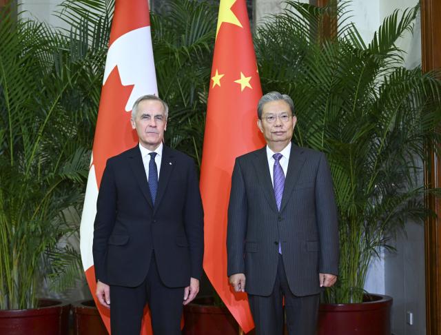 (260115) -- BEIJING, Jan. 15, 2026 (Xinhua) -- Zhao Leji, chairman of China's National People's Congress (NPC) Standing Committee, meets with Canadian Prime Minister Mark Carney in Beijing, capital of China, Jan. 15, 2026. (Xinhua/Zhang Ling)