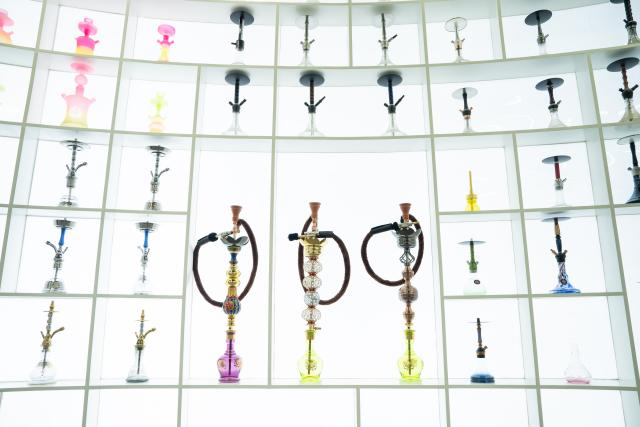 (260115) -- TIANCHANG, Jan. 15, 2026 (Xinhua) -- Hookahs are displayed at an exhibition hall in Shiliang Town of Tianchang City, east China's Anhui Province, Jan. 14, 2026. In recent years, Shiliang has leveraged its traditional foundation in the art glass industry to develop a distinctive hookah production sector. The hookahs produced are primarily for export, reaching markets in the Middle East, Europe and other regions. (Xinhua/Du Yu)