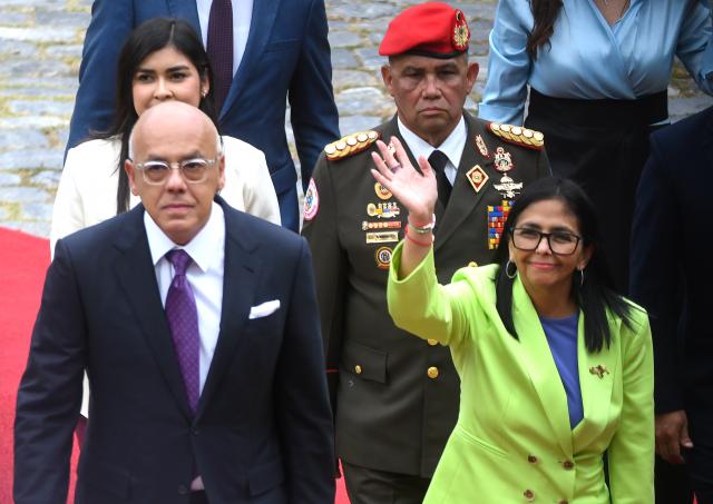 (260115) -- CARACAS, Jan. 15, 2026 (Xinhua) -- Venezuelan acting president Delcy Rodriguez (R) walks ahead of her annual report to the legislature on behalf of the administrative body in Caracas, Venezuela, Jan. 15, 2026. (Photo by Marco Salgado/Xinhua)