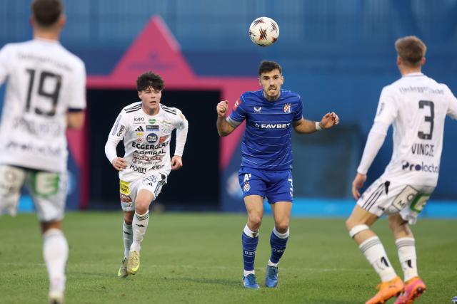(260116) -- ZAGREB, Jan. 16, 2026 (Xinhua) -- Bruno Goda (2nd R) of Dinamo Zagreb heads the ball during a friendly football match between GNK Dinamo Zagreb and TSV Hartberg in Zagreb, Croatia, on Jan. 15, 2026. (Photo by Slavko Midzor/PIXSELL via Xinhua)