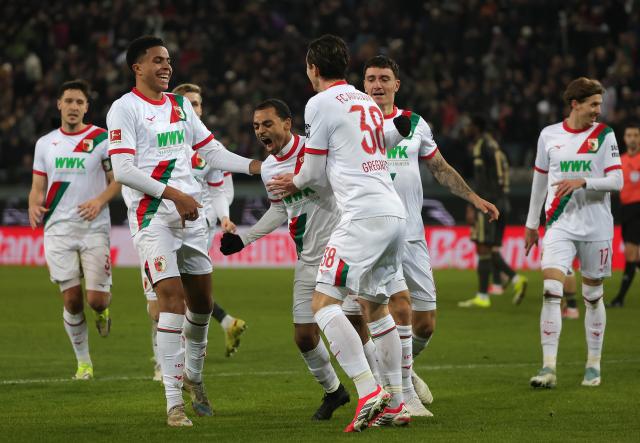 (251216) -- AUGSBURG, Dec. 16, 2025 (Xinhua) -- Players of FC Augsburg celebrate scoring during the German first division Bundesliga football match between FC Augsburg and 1. FC Union Berlin in Augsburg, Germany, Jan. 15, 2026. (Photo by Philippe Ruiz/Xinhua)