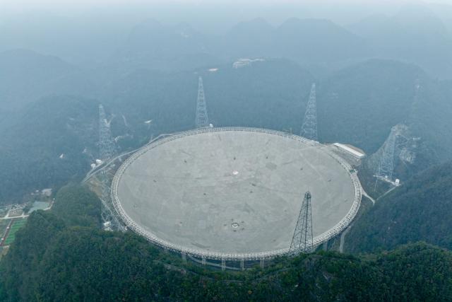 (260116) -- GUIYANG, Jan. 16, 2026 (Xinhua) -- An aerial drone photo taken on Jan. 16, 2026 shows China's Five-hundred-meter Aperture Spherical Radio Telescope (FAST) under maintenance in southwest China's Guizhou Province. Through studying the observation data of China's gigantic radio telescope located in the country's southwestern Guizhou Province, an international research team has uncovered compelling new evidence supporting a binary-system origin for at least some fast radio bursts, one of the most enigmatic phenomena in modern astrophysics.
   These findings made by the research team, led by astronomers from the Purple Mountain Observatory of the Chinese Academy of Sciences, are based on observations made by using FAST, and have been published online in the journal Science. (Xinhua/Ou Dongqu)