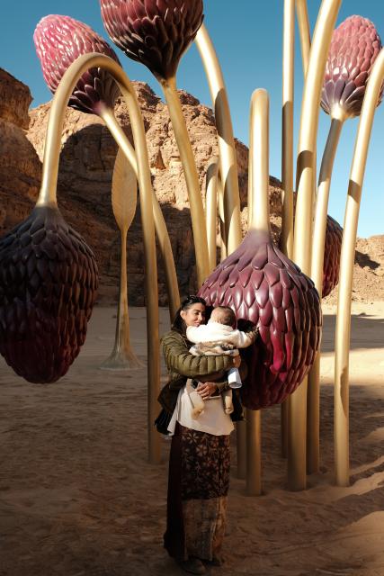 (260116) -- ALULA, Jan. 16, 2026 (Xinhua) -- People view an artwork exhibited during a preview of the art exhibition Desert X AlUla held in AlUla, Saudi Arabia, Jan. 15, 2026. Running from Jan. 16 to Feb. 28, Desert X AlUla opens its fourth edition here on Friday, showcasing 11 site-responsive artworks across valleys, canyons, and oases under the theme "Space Without Measure." (Xinhua/Xin Mengchen)