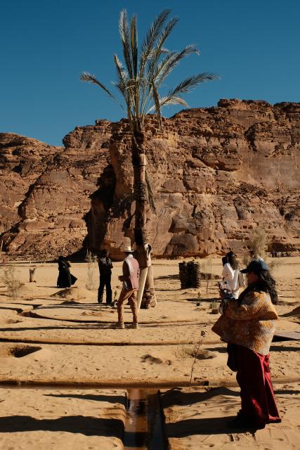 (260116) -- ALULA, Jan. 16, 2026 (Xinhua) -- People view an artwork exhibited during a preview of the art exhibition Desert X AlUla held in AlUla, Saudi Arabia, Jan. 15, 2026. Running from Jan. 16 to Feb. 28, Desert X AlUla opens its fourth edition here on Friday, showcasing 11 site-responsive artworks across valleys, canyons, and oases under the theme "Space Without Measure." (Xinhua/Xin Mengchen)