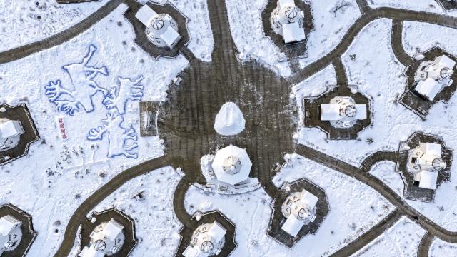 (260116) -- GENHE, Jan. 16, 2026 (Xinhua) -- An aerial drone photo taken on Jan. 15, 2026 shows traditional Ewenki tents in Aoluguya Ewenki Township in Genhe, north China's Inner Mongolia Autonomous Region. (Xinhua/Ma Jinrui)