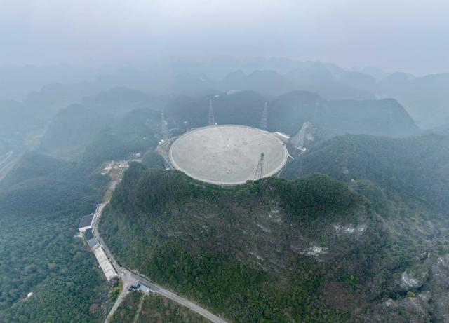 (260116) -- GUIYANG, Jan. 16, 2026 (Xinhua) -- An aerial drone photo taken on Jan. 16, 2026 shows China's Five-hundred-meter Aperture Spherical Radio Telescope (FAST) under maintenance in southwest China's Guizhou Province. Through studying the observation data of China's gigantic radio telescope located in the country's southwestern Guizhou Province, an international research team has uncovered compelling new evidence supporting a binary-system origin for at least some fast radio bursts, one of the most enigmatic phenomena in modern astrophysics.
   These findings made by the research team, led by astronomers from the Purple Mountain Observatory of the Chinese Academy of Sciences, are based on observations using FAST, and have been published online in the journal Science. (Xinhua/Ou Dongqu)