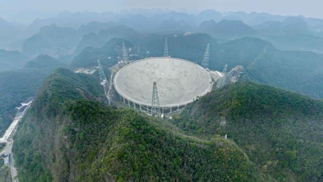 (260116) -- GUIYANG, Jan. 16, 2026 (Xinhua) -- An aerial drone photo taken on Jan. 16, 2026 shows China's Five-hundred-meter Aperture Spherical Radio Telescope (FAST) under maintenance in southwest China's Guizhou Province. Through studying the observation data of China's gigantic radio telescope located in the country's southwestern Guizhou Province, an international research team has uncovered compelling new evidence supporting a binary-system origin for at least some fast radio bursts, one of the most enigmatic phenomena in modern astrophysics.
   These findings made by the research team, led by astronomers from the Purple Mountain Observatory of the Chinese Academy of Sciences, are based on observations using FAST, and have been published online in the journal Science. (Xinhua/Ou Dongqu)