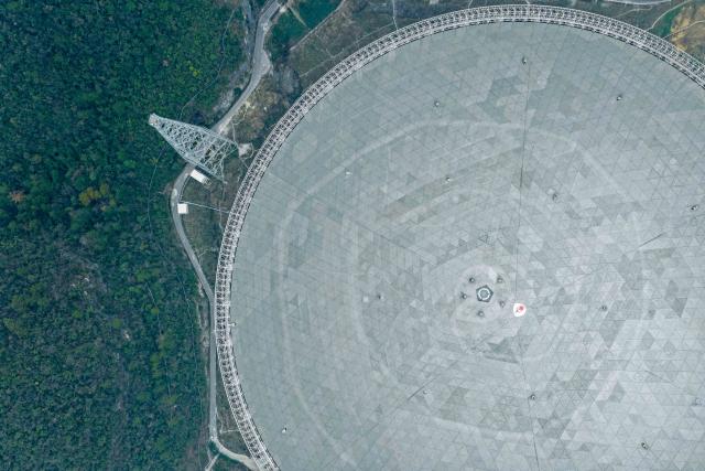 (260116) -- GUIYANG, Jan. 16, 2026 (Xinhua) -- An aerial drone photo taken on Jan. 16, 2026 shows China's Five-hundred-meter Aperture Spherical Radio Telescope (FAST) under maintenance in southwest China's Guizhou Province. Through studying the observation data of China's gigantic radio telescope located in the country's southwestern Guizhou Province, an international research team has uncovered compelling new evidence supporting a binary-system origin for at least some fast radio bursts, one of the most enigmatic phenomena in modern astrophysics.
   These findings made by the research team, led by astronomers from the Purple Mountain Observatory of the Chinese Academy of Sciences, are based on observations using FAST, and have been published online in the journal Science. (Xinhua/Ou Dongqu)