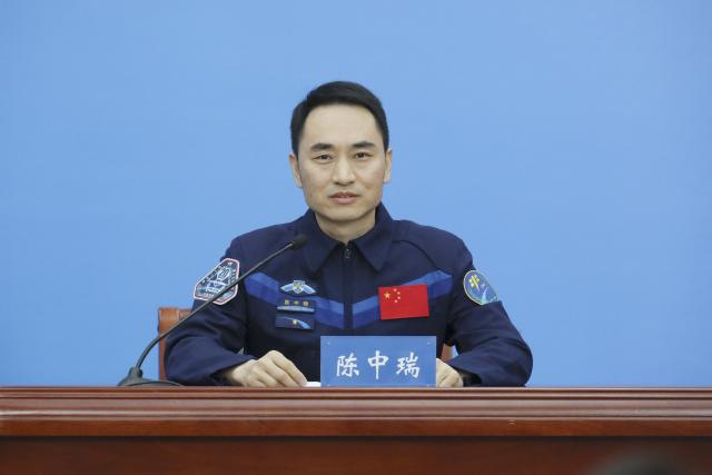 (260116) -- BEIJING, Jan. 16, 2026 (Xinhua) -- Astronaut Chen Zhongrui from China's Shenzhou-20 crewed mission speaks during a press conference in Beijing, capital of China, Jan. 16, 2026. The three astronauts from China's Shenzhou-20 crewed mission met the press in Beijing on Friday, their first public appearance after returning to Earth in November last year. (Xinhua/Li Minggang)
