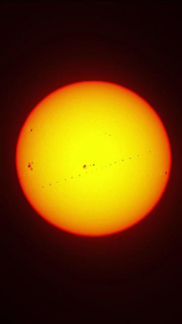 (260116) -- BEIJING, Jan. 16, 2026 (Xinhua) -- A stacked composite photo taken on Jan. 16, 2026 in China's capital Beijing shows the Chinese space station passing in front of the Sun. (Photo by Wang Junfeng/Xinhua)