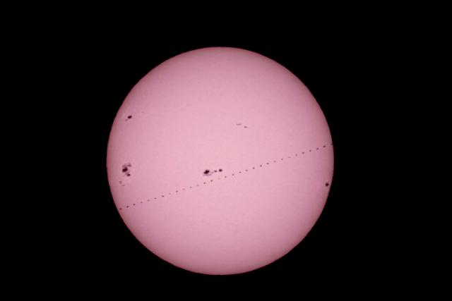 (260116) -- BEIJING, Jan. 16, 2026 (Xinhua) -- A stacked composite photo taken on Jan. 16, 2026 in China's capital Beijing shows the Chinese space station passing in front of the Sun. (Photo by Zhong Yi/Xinhua)