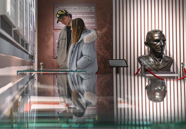 (260116) -- CHONGQING, Jan. 16, 2026 (Xinhua) -- American visitors view exhibits at the Stilwell Museum in southwest China's Chongqing, on Jan. 16, 2026. Nineteen faculty and students from Elon University in the United States joined peers from Sichuan University, Sichuan International Studies University, and Chongqing Nankai Secondary School for an exchange event at the Stilwell Museum on Friday. The Museum is named after Joseph Stilwell, a U.S. general who helped the Chinese people in their fight against Japanese aggression during World War II.
   Co-hosted by the Chongqing People's Association for Friendship with Foreign Countries and the Stilwell Research Center, the event featured a tour of Joseph Stilwell's former residence and a WWII exhibition, culminating in a friendly game of ping-pong between the Chinese and American youths. (Xinhua/Chen Cheng)