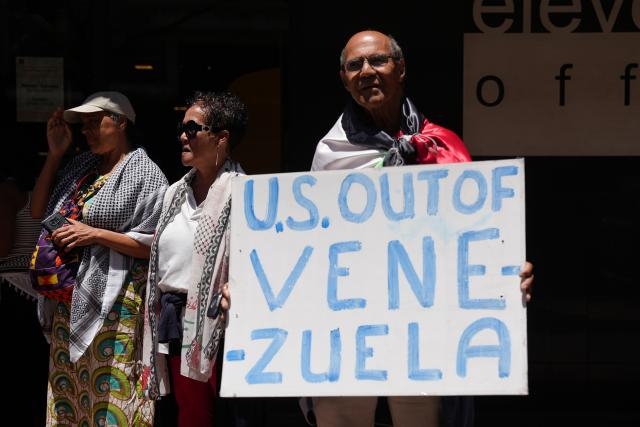 (260116) -- CAPE TOWN, Jan. 16, 2026 (Xinhua) -- People take part in a protest against U.S. military action in Venezuela in Cape Town, South Africa, Jan. 16, 2026. A protest was held on Friday in Cape Town, South Africa's legislative capital, against U.S. military action in Venezuela, with demonstrators calling for the immediate release of Venezuelan President Nicolas Maduro and his wife, Cilia Flores. (Xinhua/Wang Lei)