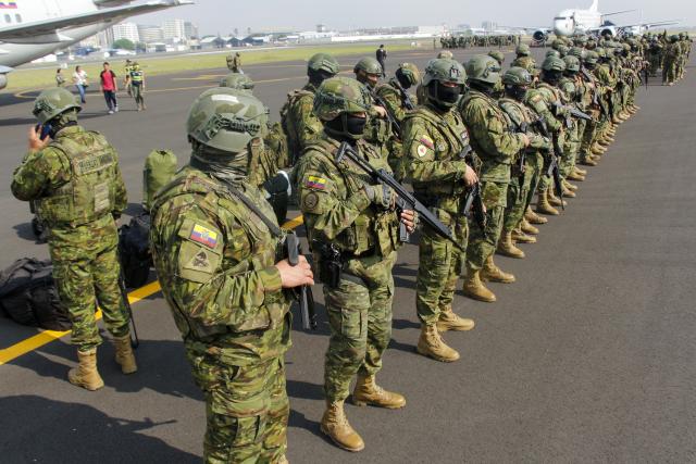 (260116) -- GUAYAQUIL, Jan. 16, 2026 (Xinhua) -- Members of the Ecuadorian Armed Forces remain in formation after their arrival at a military airbase in Guayaquil, Ecuador, Jan. 16, 2026. The Government of Ecuador announced on Thursday a massive deployment of nearly 10,000 military personnel in the coastal provinces, as part of a new offensive phase against organized crime. (Photo by Ricardo Landeta/Xinhua)