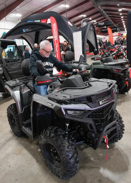 (260117) -- ABBOTSFORD, Jan. 17, 2026 (Xinhua) -- A man tries an All-Terrain Vehicles (ATV) during the 2026 BC Motorcycle and Powersports Show in Abbotsford, British Columbia, Canada, on Jan. 16, 2026. The three-day event kicked off here on Friday, featuring the latest motorcycles, cruisers, off-road bikes, All-Terrain Vehicles (ATV), and electric-powered vehicles. (Photo by Liang Sen/Xinhua)