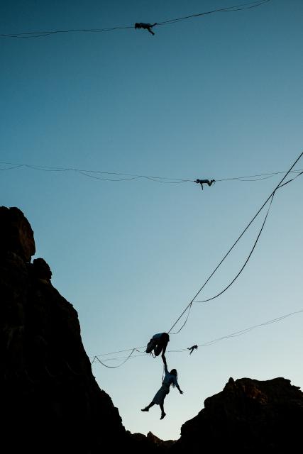 (260117) -- ALULA, Jan. 17, 2026 (Xinhua) -- Acrobats present an aerial art performance titled Vertigo in AlUla, Saudi Arabia, Jan. 16, 2026. Originally presented in Paris, Vertigo combines highlining, acrobatics and immersive music to explore gravity, self-transcendence and the power of solidarity through the performers' dynamic interaction with space. (Xinhua/Xin Mengchen)