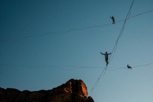 (260117) -- ALULA, Jan. 17, 2026 (Xinhua) -- Acrobats present an aerial art performance titled Vertigo in AlUla, Saudi Arabia, Jan. 16, 2026. Originally presented in Paris, Vertigo combines highlining, acrobatics and immersive music to explore gravity, self-transcendence and the power of solidarity through the performers' dynamic interaction with space. (Xinhua/Xin Mengchen)
