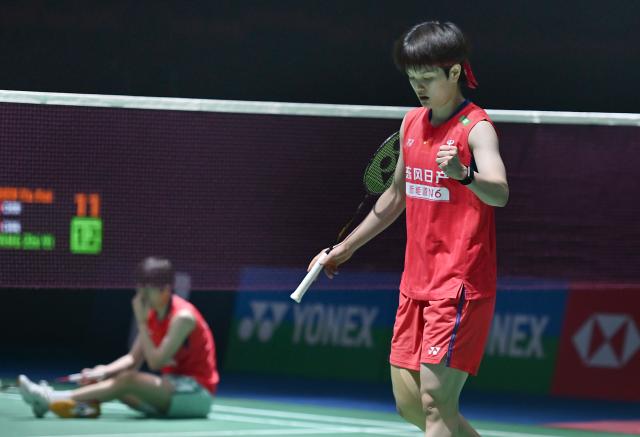 (260117) -- NEW DELHI, Jan. 17, 2026 (Xinhua) -- China's Wang Zhiyi (R) celebrates scoring during the women's singles semifinal match against her compatriot Chen Yufei at India Open badminton tournament 2026 in New Delhi, India, Jan. 17, 2026. (Photo by Javed Dar/Xinhua)