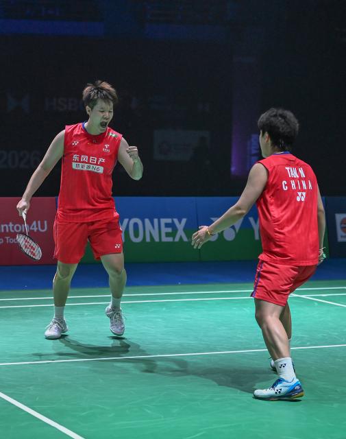 (260117) -- NEW DELHI, Jan. 17, 2026 (Xinhua) -- China's Liu Shengshu (L)/Tan Ning react after winning a point while competing against South Korea's Baek Ha Na/Lee So Hee during women's doubles semi-final match at India Open 2026 in New Delhi, Jan 17, 2026. (Xinhua/Javed Dar)