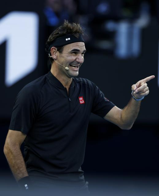 (260117) -- MELBOURNE, Jan. 17, 2026 (Xinhua) -- Former tennis player Roger Federer of Switzerland reacts during the opening ceremony exhibition match at the 2026 Australian Open at Melbourne Park in Melbourne, Australia, Jan. 17, 2026. (Xinhua/Ma Ping)