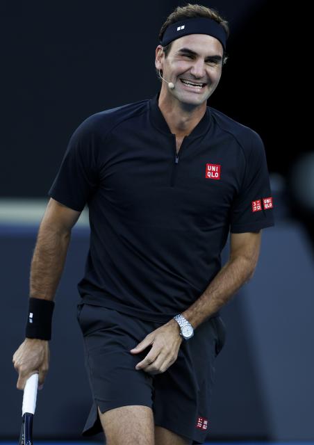 (260117) -- MELBOURNE, Jan. 17, 2026 (Xinhua) -- Former tennis player Roger Federer of Switzerland reacts during the opening ceremony exhibition match at the 2026 Australian Open at Melbourne Park in Melbourne, Australia, Jan. 17, 2026. (Xinhua/Ma Ping)