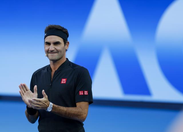 (260117) -- MELBOURNE, Jan. 17, 2026 (Xinhua) -- Former tennis player Roger Federer of Switzerland reacts before the opening ceremony exhibition match at the 2026 Australian Open at Melbourne Park in Melbourne, Australia, Jan. 17, 2026. (Xinhua/Ma Ping)