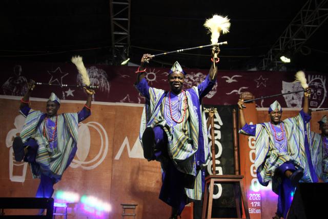 (260117) -- OUIDAH, Jan. 17, 2026 (Xinhua) -- Performers take part in the opening ceremony of the 17th Agogo International Dance Festival, in Ouidah, Benin, on Jan. 16, 2026. The festival, featuring dancers and acrobats from around the world, runs until Jan. 18. (Photo by Seraphin Zounyekpe/Xinhua)