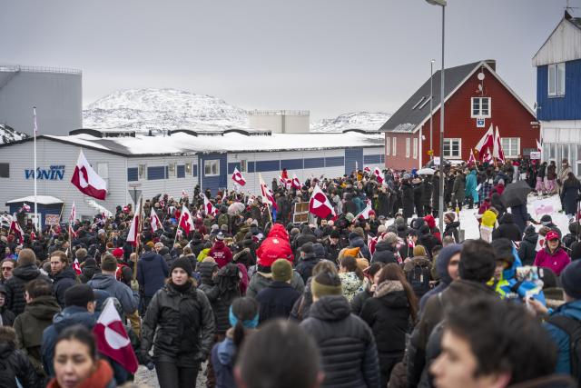 (260118) -- NUUK, Jan. 18, 2026 (Xinhua) -- People attend a demonstration against U.S. actions and remarks suggesting control over Greenland in Nuuk, capital of Greenland, an autonomous territory of Denmark, Jan. 17, 2026. TO GO WITH "Feature: 'Hands off Greenland': protesters push back at U.S. takeover bid." (Photo by Anders Kongshaug/Xinhua)