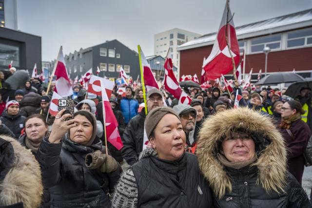 (260118) -- NUUK, Jan. 18, 2026 (Xinhua) -- People attend a demonstration against U.S. actions and remarks suggesting control over Greenland in Nuuk, capital of Greenland, an autonomous territory of Denmark, Jan. 17, 2026. TO GO WITH "Feature: 'Hands off Greenland': protesters push back at U.S. takeover bid." (Photo by Anders Kongshaug/Xinhua)