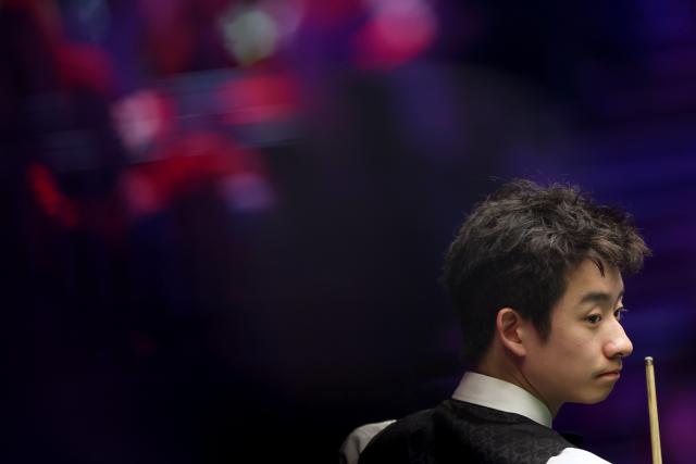 (260118) -- LONDON, Jan. 18, 2026 (Xinhua) -- Wu Yize of China reacts during the semifinal match against Kyren Wilson of England at the 2026 Snooker Masters in London, Britain, Jan. 17, 2026. (Xinhua/Li Ying)