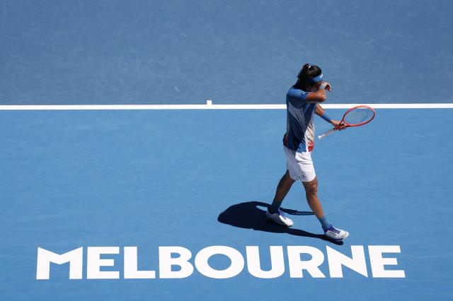 (260118) -- MELBOURNE, Jan. 18, 2026 (Xinhua) -- Zhang Zhizhen of China reacts during the men's singles first round match between Zhang Zhizhen of China and Francisco Cerundolo of Argentina at the Australian Open tennis tournament 2026 in Melbourne, Australia, Jan. 18, 2026. (Xinhua/Ma Ping)