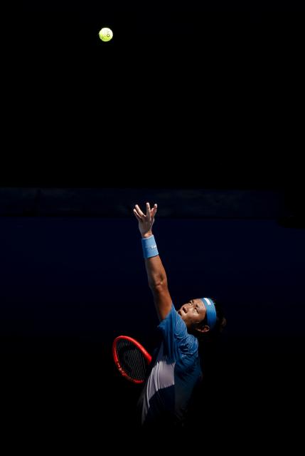 (260118) -- MELBOURNE, Jan. 18, 2026 (Xinhua) -- Zhang Zhizhen of China serves during the men's singles first round match between Zhang Zhizhen of China and Francisco Cerundolo of Argentina at the Australian Open tennis tournament 2026 in Melbourne, Australia, Jan. 18, 2026. (Xinhua/Ma Ping)