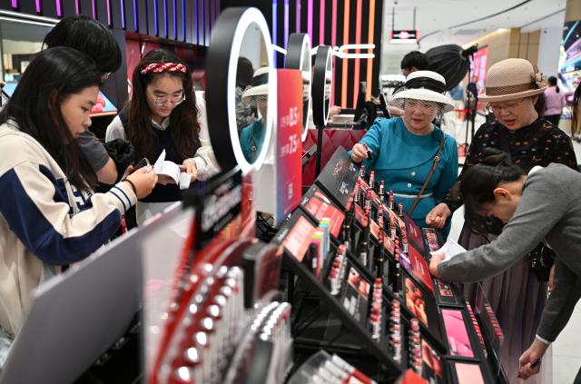 (260118) -- HAIKOU, Jan. 18, 2026 (Xinhua) -- Costumers shop at a duty-free store in Haikou, south China's Hainan Province, on Jan. 17, 2026. On Dec. 18 last year, China launched island-wide special customs operations in the Hainan Free Trade Port (FTP), allowing freer entry of overseas goods, expanding zero-tariff coverage, and introducing more business-friendly measures.
   One month into the island-wide special customs operations, Hainan FTP in south China has seen a sharp rise in duty-free purchases.
   According to Haikou Customs, from Dec. 18, 2025 to Jan. 17, 2026, the duty-free sales supervised by customs reached 4.86 billion yuan (about 693.5 million U.S. dollars), up 46.8 percent year on year, and the number of shoppers rose 30.2 percent year on year to 745,000, showing sustained strong consumption vitality. (Xinhua/Guo Cheng)