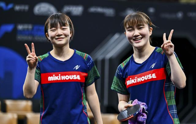 (260118) -- DOHA, Jan. 18, 2026 (Xinhua) -- Yokoi Sakura/Odo Satsuki (R) of Japan celebrate after winning the women's doubles final match against Sato Hitomi/Shibata Saki of Japan at the WTT Star Contender Doha 2026 in Doha, Qatar, Jan. 17, 2026. (Photo by Nikku/Xinhua)