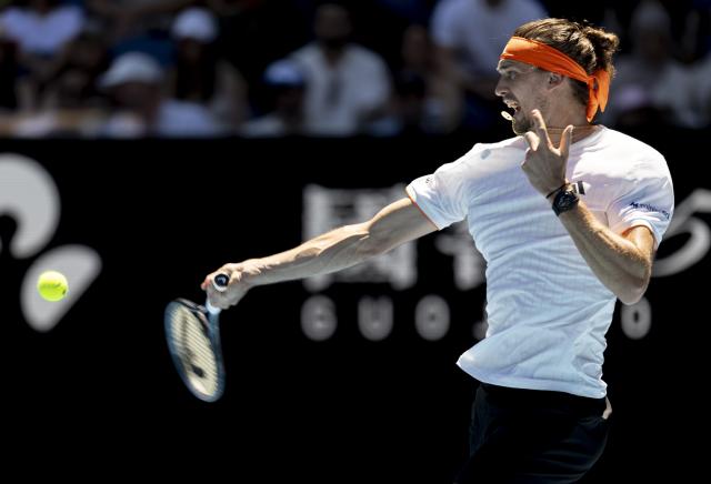 (260118) -- MELBOURNE, Jan. 18, 2026 (Xinhua) -- Alexander Zverev hits a return during the men's singles 1st round match between Alexander Zverev of Germany and Gabriel Diallo of Canada at the Australian Open tennis tournament in Melbourne, Australia, Jan. 18, 2026. (Photo by Hu Jingchen/Xinhua)