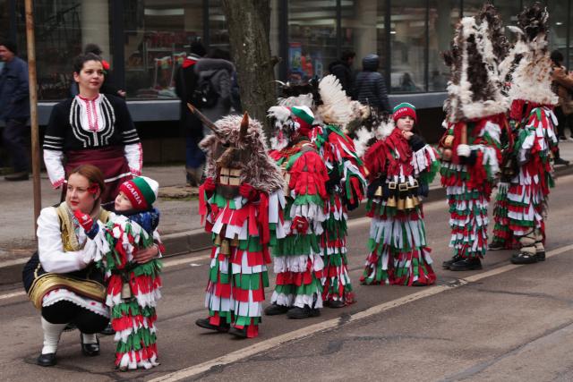(260118) -- PERNIK, Jan. 18, 2026 (Xinhua) -- Performers prepare for a parade during the "Surva" International Festival of Masquerade Games held in Pernik, Bulgaria, on Jan. 17, 2026. More than 30 masquerade groups from various parts of Bulgaria and other countries such as Spain, Italy and Croatia will bring a visually stunning feast, full of cultural charm, to the audience during the festival lasting from Jan. 16 to Jan. 25. (Xinhua/Yao Yulin)