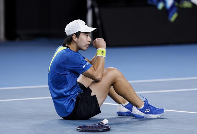(260118) -- MELBOURNE, Jan. 18, 2026 (Xinhua) -- Bai Zhuoxuan celebrates after winning the women's singles 1st round match between Bai Zhuoxuan of China and Anastasia Pavlyuchenkova of Russia at the Australian Open tennis tournament in Melbourne, Australia, Jan. 18, 2026. (Xinhua/Ma Ping)