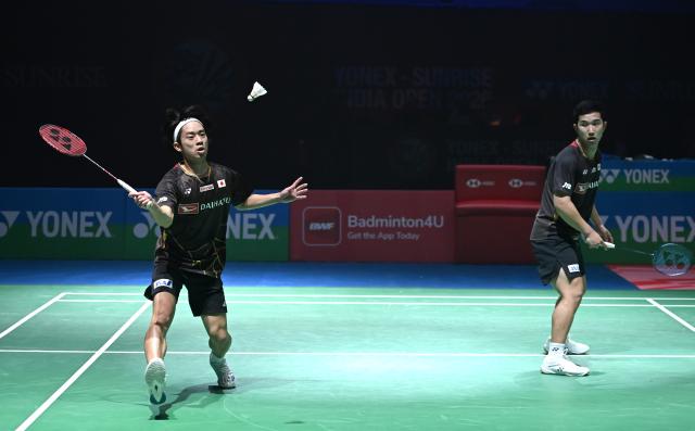 (260118) -- NEW DELHI, Jan. 18, 2026 (Xinhua) -- Midorikawa Hiroki (L)/Yamashita Kyohei of Japan compete during the men's doubles final match between Liang Weikeng/Wang Chang of China and Midorikawa Hiroki/Yamashita Kyohei of Japan at the India Open 2026 in New Delhi, India, Jan. 18, 2026. (Xinhua/Javed Dar)