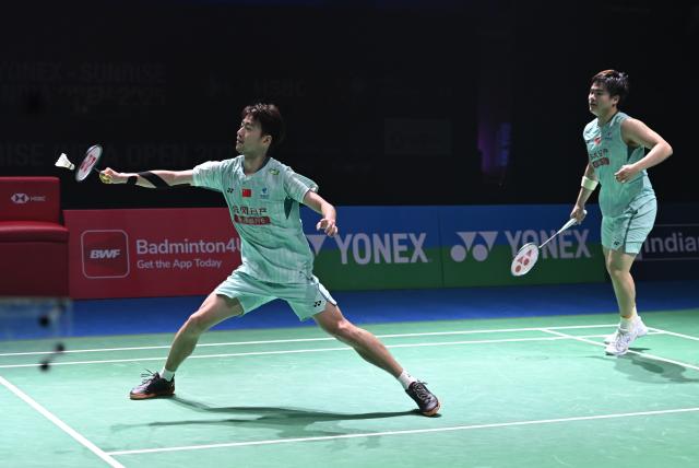 (260118) -- NEW DELHI, Jan. 18, 2026 (Xinhua) -- Liang Weikeng/Wang Chang (L) of China compete during the men's doubles final match between Liang Weikeng/Wang Chang of China and Midorikawa Hiroki/Yamashita Kyohei of Japan at the India Open 2026 in New Delhi, India, Jan. 18, 2026. (Xinhua/Javed Dar)