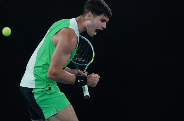 (260118) -- MELBOURNE, Jan. 18, 2026 (Xinhua) -- Carlos Alcaraz of Spain celebrates scoring during the men's singles 1st round match between Carlos Alcaraz of Spain and Adam Walton of Australia at the Australian Open tennis tournament in Melbourne, Australia, Jan. 18, 2026. (Photo by Wang Shen/Xinhua)