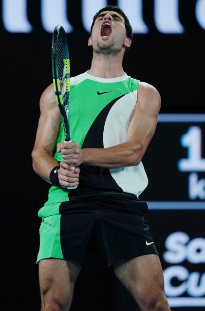 (260118) -- MELBOURNE, Jan. 18, 2026 (Xinhua) -- Carlos Alcaraz of Spain celebrates scoring during the men's singles 1st round match between Carlos Alcaraz of Spain and Adam Walton of Australia at the Australian Open tennis tournament in Melbourne, Australia, Jan. 18, 2026. (Photo by Wang Shen/Xinhua)