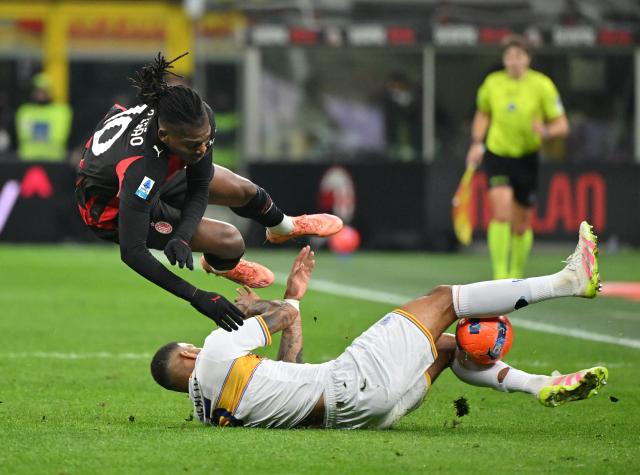 (260119) -- MILAN, Jan. 19, 2026 (Xinhua) -- AC Milan's Rafael Leao (L) vies with Lecce's Jamil Siebert during a Serie A football match between AC Milan and Lecce in Milan, Italy, Jan. 18, 2026. (Photo by Alberto Lingria/Xinhua)