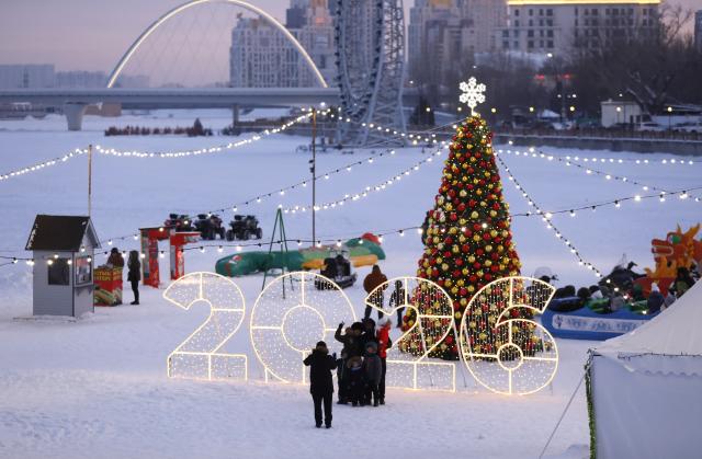 (260119) -- ASTANA, Jan. 19, 2026 (Xinhua) -- Ice and snow recreational facilities are seen on the frozen Ishim River in Astana, Kazakhstan, Jan. 18, 2026. (Photo by Kalizhan Ospanov/Xinhua)