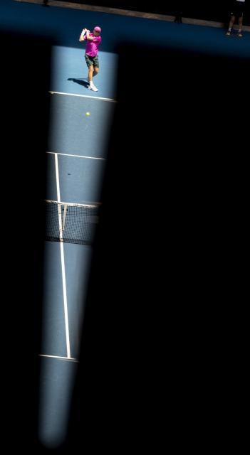 (260119) -- MELBOURNE, Jan. 19, 2026 (Xinhua) -- Jesper de Jong of the Netherlands hits a return during the men's singles 1st round match against Daniil Medvedev of Russia at the Australian Open tennis tournament in Melbourne, Australia, Jan. 19, 2026. (Photo by Hu Jingchen/Xinhua)