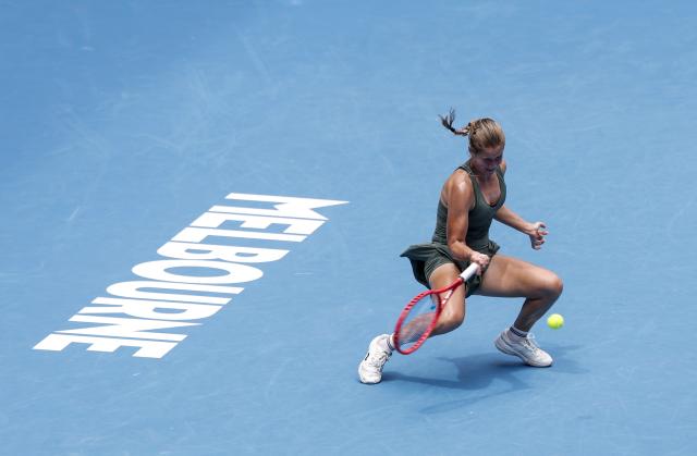 (260119) -- MELBOURNE, Jan. 19, 2026 (Xinhua) -- Anastasia Zakharova of Russia hits a return during the women's singles 1st round match against Jessica Pegula of the United States at the Australian Open tennis tournament in Melbourne, Australia, Jan. 19, 2026. (Xinhua/Ma Ping)