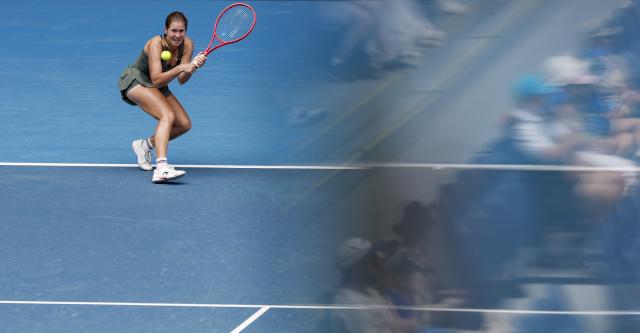 (260119) -- MELBOURNE, Jan. 19, 2026 (Xinhua) -- Anastasia Zakharova of Russia hits a return during the women's singles 1st round match against Jessica Pegula of the United States at the Australian Open tennis tournament in Melbourne, Australia, Jan. 19, 2026. (Xinhua/Ma Ping)